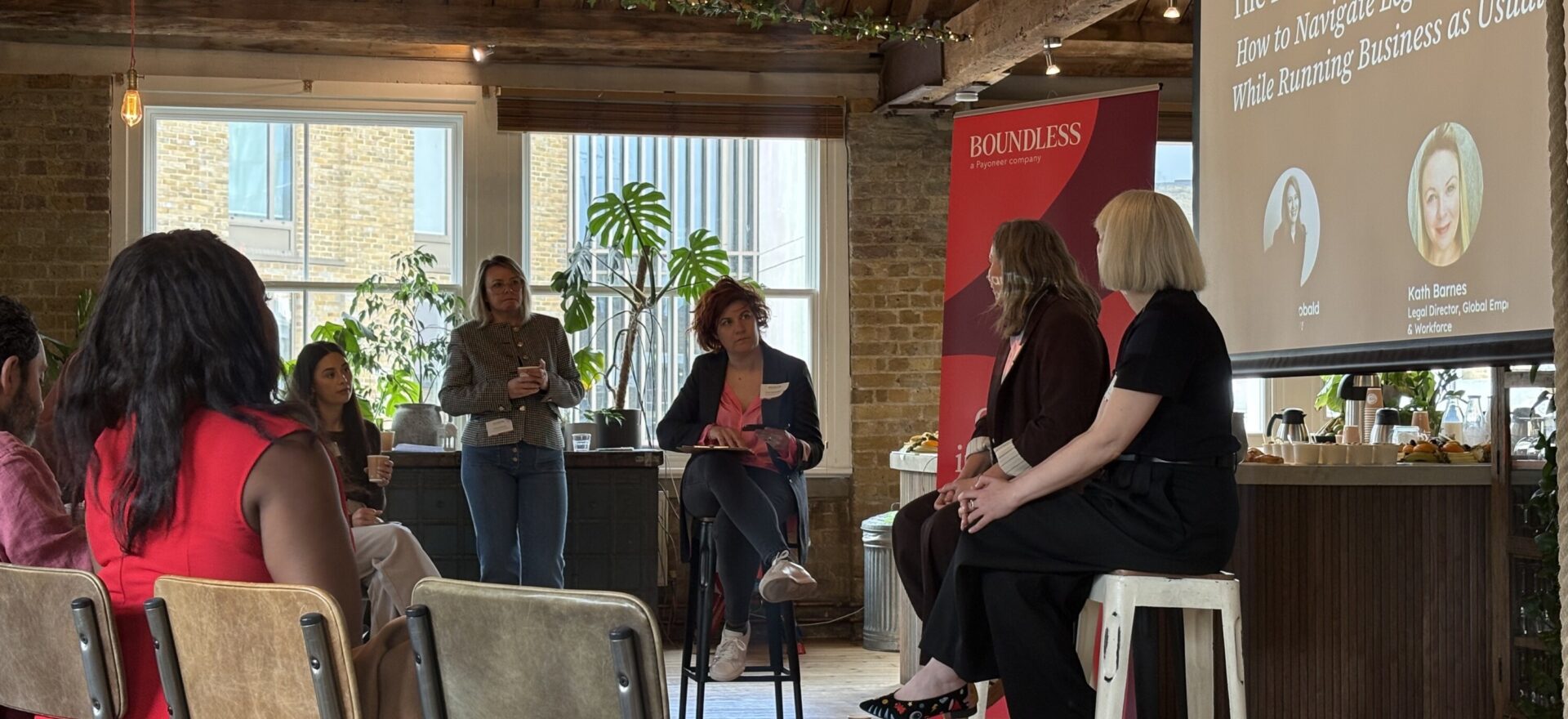 Boundless breakfast event, featuring Sam Theobald, Kathryn Barnes, and Dee Coakley discussing how to balance legislative change with business as usual.